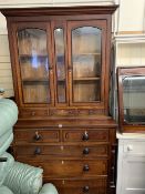 CIRCA 1840 ANGLESEY OAK & MAHOGANY BOOKCASE TOP CHEST having twin arched top glazed door and central