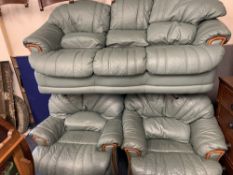 MODERN GREEN SOFT LEATHER EFFECT THREE PIECE LOUNGE SUITE comprising three seater settee, 88cms H,