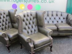 THREE PIECE LOUNGE SUITE - presumed leather and little used consisting of button backed three seater