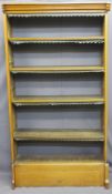 VICTORIAN OAK OPEN BOOKCASE with shaped cornice, interior adjustable shelves and lift-up lower