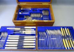 OAK CASED PART CANTEEN OF CUTLERY, mainly Walker & Hall, with others, two lift out trays and