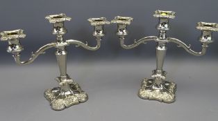 EPNS - a pair of three branch candle holders, 26cms tall