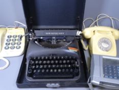 REMINGTON RAND VINTAGE TYPEWRITER IN A CASE and a quantity of old telephones