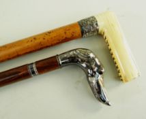 TWO GENTLEMEN'S WALKING CANES, comprising a Victorian malacca cane with ivory handle and embossed