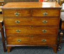 REGENCY MAHOGANY CHEST, reeded top above two short and three graduated long drawers, high bracket