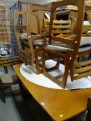 MID-CENTURY STYLE TEAK DINING SUITE BY PORTWOOD comprising extending dining table, 138cms wide (