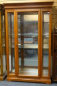 MODERN VICTORIAN-STYLE CHINA CABINET, cavetto cornice above glazed central door, 122cms wide