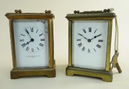 TWO EARLY 20TH CENTURY BRASS CARRIAGE CLOCKS both with enamel faces and Roman numeral chapter rings.