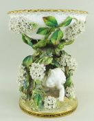 MOORE BROS PORCELAIN CENTREPIECE COMPORT modelled as a basket, supported by white flowers and a