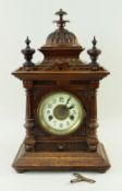 LATE 19TH CENTURY WALNUT CASED ARCHITECTURAL MANTEL CLOCK with cupola and turned finial surmount,