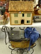 VINTAGE DOLL'S HOUSE with thatched roof and assortment of furniture (distressed), a vintage doll's
