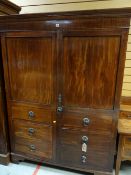 EARLY 19TH CENTURY MAHOGANY & BOXWOOD STRUNG WARDROBE, angled cornice, panelled doors with dummy