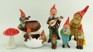 SMALL COLLECTION OF GERMAN POTTERY GNOME FIGURES including two vases shaped as an egg, a pinecone