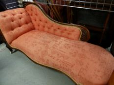 VICTORIAN CHAISE LONGUE, with leaf carved scrolled side, cabriole legs, castors, 190cms long