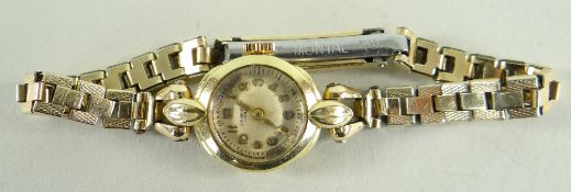 14CT GOLD J. W. BENSON LADIES WRISTWATCH having stainless steel bracelet in box