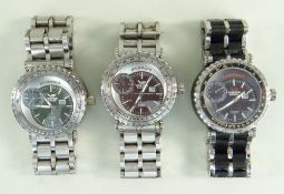 THREE VOSTOK 'ENERGIA' STAINLESS STEEL GENTLEMAN'S AUTOMATIC WRISTWATCHES with black, red and