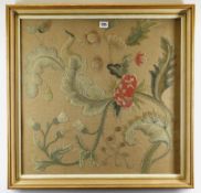 DECORATIVE WOOLWORK PICTURE, depicting wild flowers including wild rose, knapweed ETC on brown