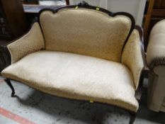 EDWARDIAN MAHOGANY CANAPE SETTEE upholstered in golden floral embossed fabric, 135cms wide Condition