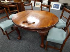 VICTORIAN-STYLE MAHOGANY EXTENDING OVAL DINING TABLE, with one extra leaf, gadrooned edge and leaf