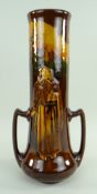 ROYAL DOULTON 'KINGSWARE' VASE BY CHARLES NOKE, decorated with a barefooted monk holding a tome,