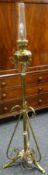 ARTS & CRAFTS BRASS & COPPER STANDARD OIL LAMP in the style of W.A.S Benson, with glass funnel