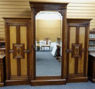 GOOD LATE VICTORIAN 'AESTHETIC' STYLE TRIPLE WARDROBE, floral carved panelled cupboards with brass