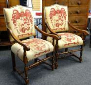 PAIR OF LOUIS XIV-STYLE OAK ARMCHAIRS, padded camel backs and stuffover seats upholstered in