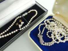 GRADUATED PEARL NECKLACE with 9ct white gold and diamond chip clasp together with another similar