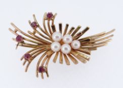 9CT GOLD FLORAL BAR BROOCH set with rubies and pearls, 5.9gms in Crouch of Swansea box