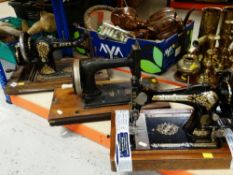 THREE VINTAGE SEWING MACHINES, one by Jones and another by Singer with its mahogany cover