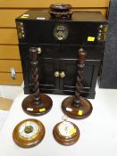 CHINESE SMALL TABLE CABINET, pair of oak candlesticks, two barometers, wooden stand (7)