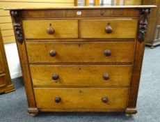 LATE VICTORIAN OAK CHEST fitted two short and three long graduated drawers, foliate corbels (feet