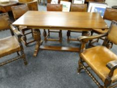 ELIZABETHAN STYLE OAK TRESTLE DINING TABLE, 152cms long together with set of six stained oak and