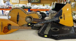 FOUR STRINGED INSTRUMENTS including classical guitar, mandolin, zither and balalaika (4)