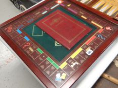 FRANKLIN MINT COLLECTOR'S EDITION MONOPOLY GAME in stained mahogany with pull out drawers and