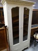MODERN WHITE PAINTED PROVINCIAL FRENCH STYLE VITRINE, ogee cornice above shaped glazed doors