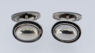 PAIR OF GEORG JENSEN SILVER CUFFLINKS of oval domed form marked '925 S Denmark Georg Jensen 44B',