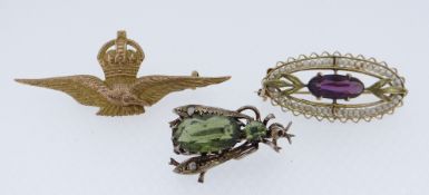 THREE ASSORTED BAR BROOCHES comprising 10k gold amethyst and seed pearl oval brooch, silver (800)