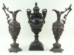 PAIR OF CAST METAL ALLOY EWERS IN THE RENAISSANCE STYLE, 44cms high and a cast metal urn and