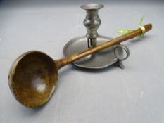 POLISHED WOODEN LADLE (PROBABLY WALNUT) and a vintage pewter chamber stick, 39cms L and 11.5cms H