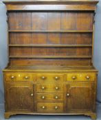 CIRCA 1820 NORTH WALES OAK DRESSER with a three shelf rack over a T arrangement of six pine lined