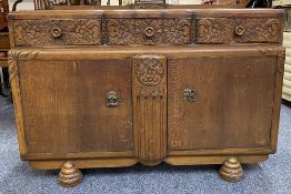 VINTAGE CARVED OAK RAILBACK SIDEBOARD on bulbous supports, 97cms H, 132cms W, 50cms max D