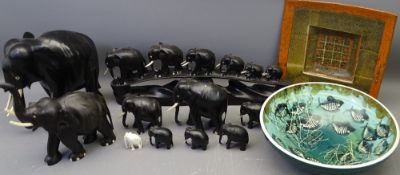 EBONY ELEPHANTS & STYLISH MODERN POTTERY, a collection including a carved train of six elephants