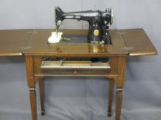 SEWING TABLE WITH SINGER CONTENTS and compartmented drop front, 79cms H, 35cms W, 45cms D (closed)