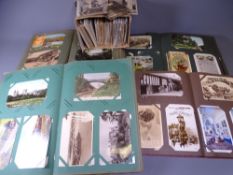 APPROXIMATELY 1000 PLUS VINTAGE POSTCARDS - four albums and a loose quantity including busy street
