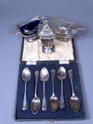 MATCHED THREE PIECE CONDIMENT SET and a cased set of six teaspoons, 11.2 troy ozs gross weighable,