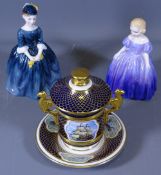TWO ROYAL DOULTON LADY FIGURINES and a Spode bone china gilt decorated cup cover and saucer, the