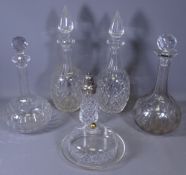 CUT GLASS DECANTERS WITH STOPPERS, a pair, with two further decanters and stoppers, butter dish