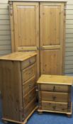 MODERN PINE BEDROOM FURNITURE comprising wardrobe, 185cms H, 100cms W, 59cms D and two narrow