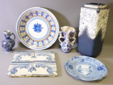 CIRCULAR TIN GLAZED CHARGER, one other plate, four delft tiles, delft puzzle jug, a stoneware jug
